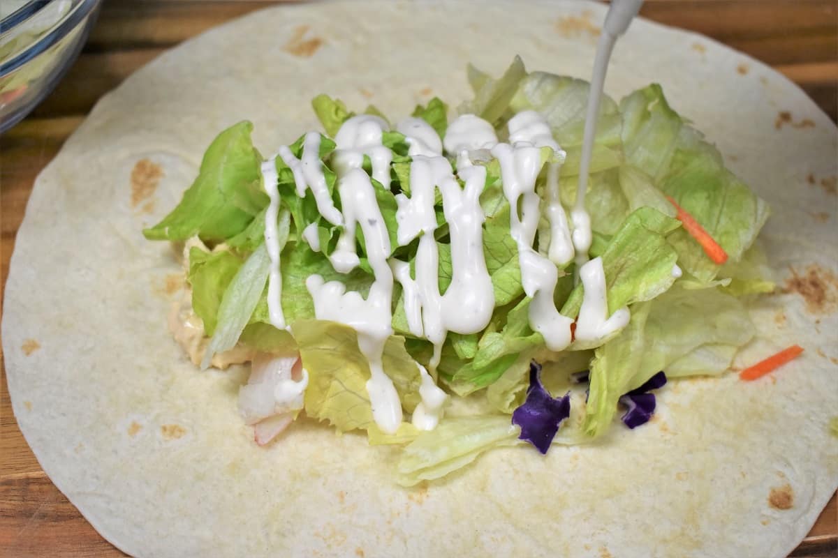 Buffalo Chicken Lettuce and Ranch Dressing on a Large Flour Tortilla