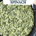 A close-up of a rich and creamy spinach dish with a text overlay reading "Easy Creamed Spinach.