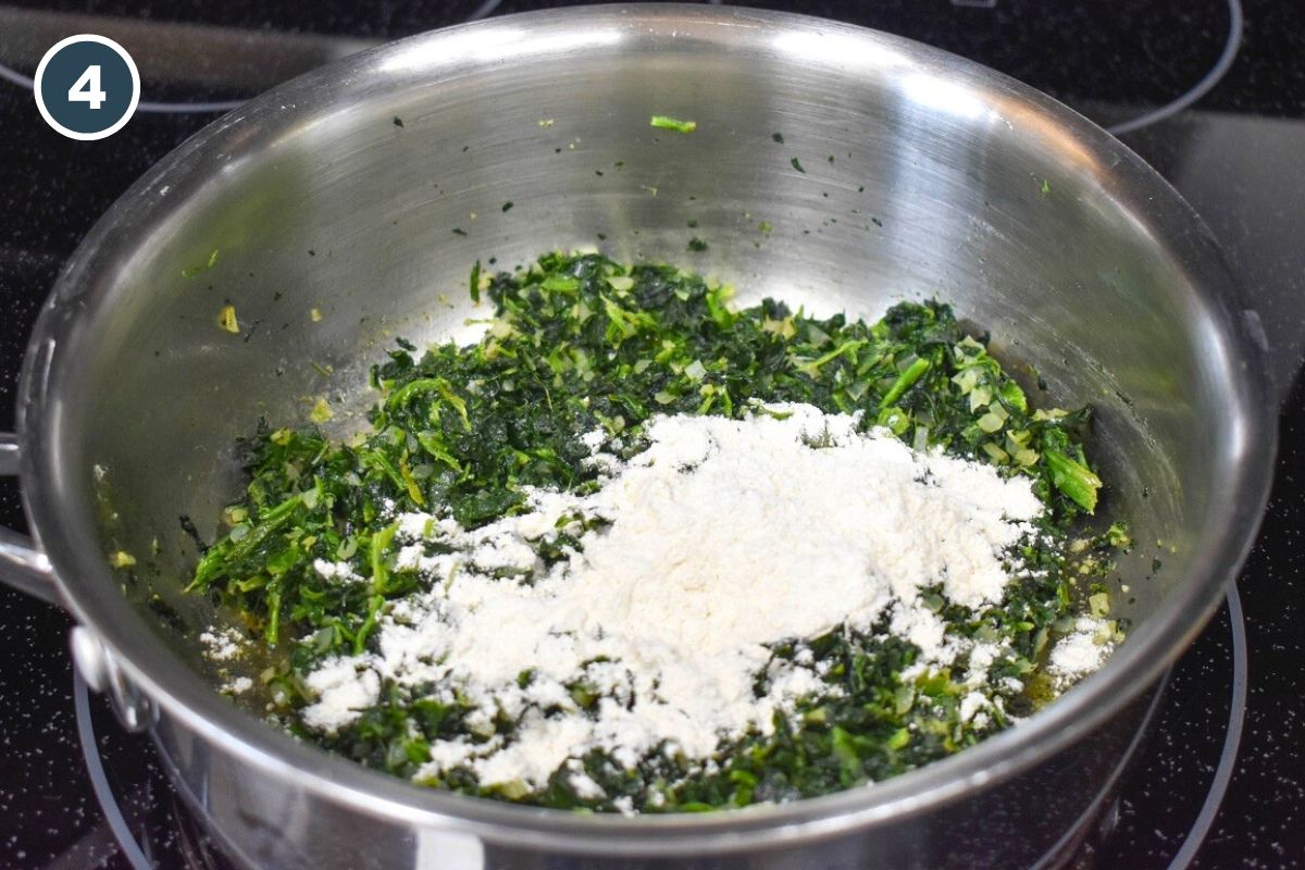 Flour sprinkled over the cooked spinach mixture.