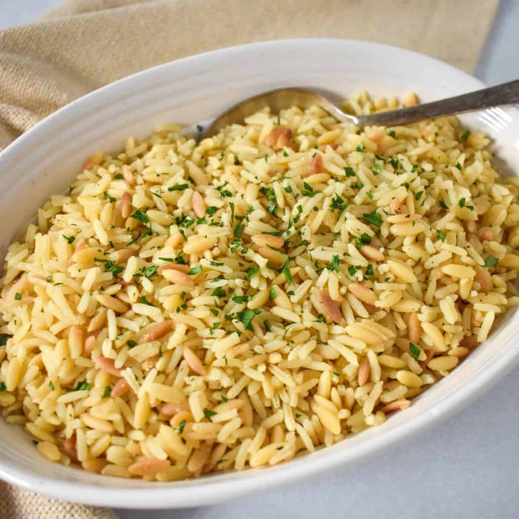 https://www.cook2eatwell.com/wp-content/uploads/2021/10/chicken-flavored-rice-image-1-1024x1024.jpg