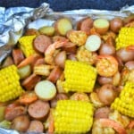 An image of the cooked shrimp dinner in the opened foil packet.