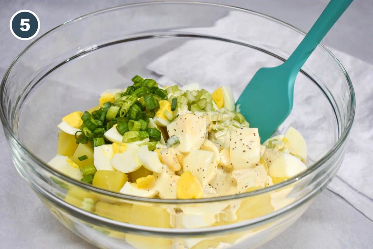 All the ingredients for the dish in a large, glass bowl before stirring.