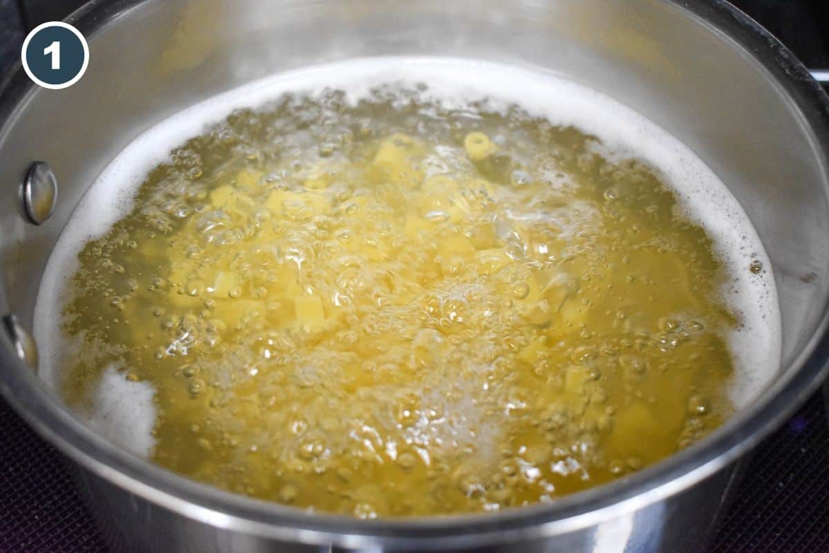 Pasta boiling in a large pot.