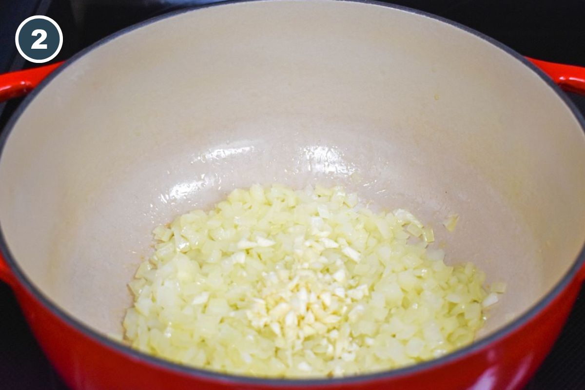 Minced garlic added to sauteed onions.