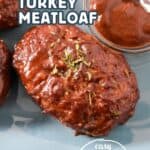 Mini turkey meatloaf Pinterest pin with text overlay that reads 'Mini Turkey Meatloaf' and 'Easy Dinner Recipe!' on an image of glazed meatloaves with sauce.